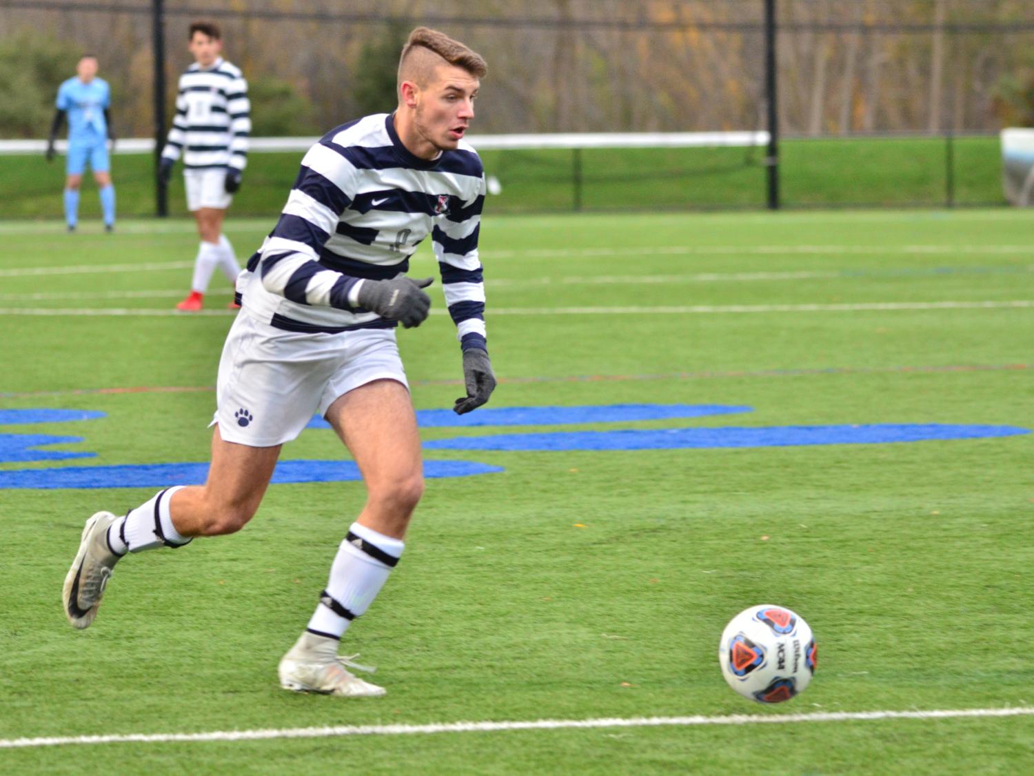 Penn State Behrend soccer player Richard Blanchard prepares to kick the ball