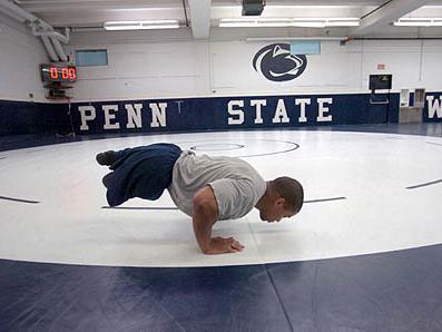 Inspirational and former Penn State wrestler Rohan Murphy works out at Penn State.