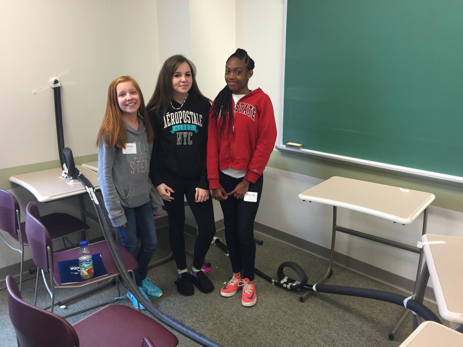 Sydney Schuster, Gabriella Haines and Maryah Jones (pictured from left to right) participated in Roller Coaster Physics at the 19th annual Math Options Career Day at Penn State Behrend on May 12.