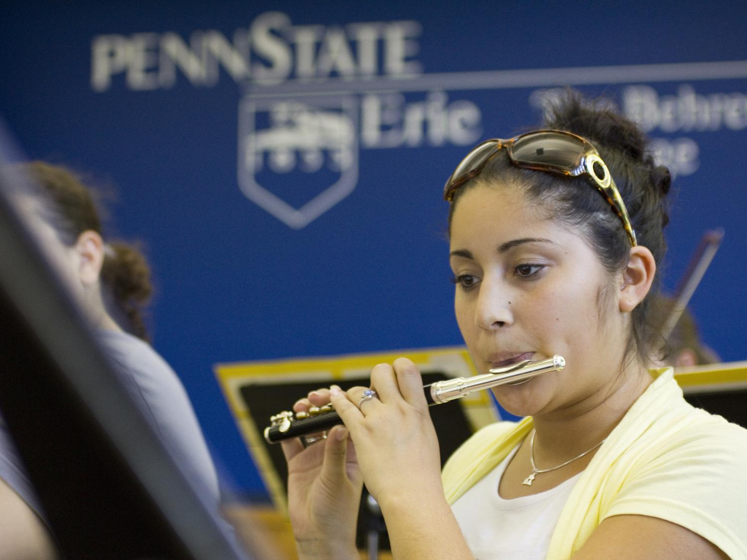 A student musician rehearses with the Penn State Behrend Concert Band.