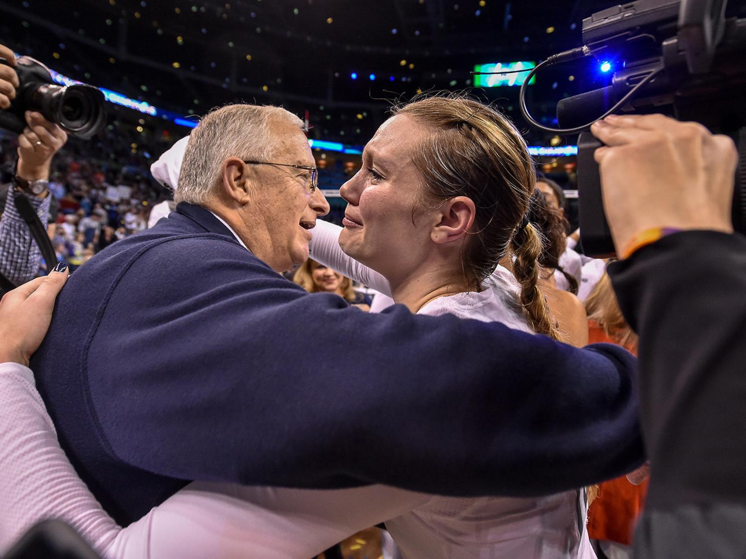 Russ Rose celebrates with player