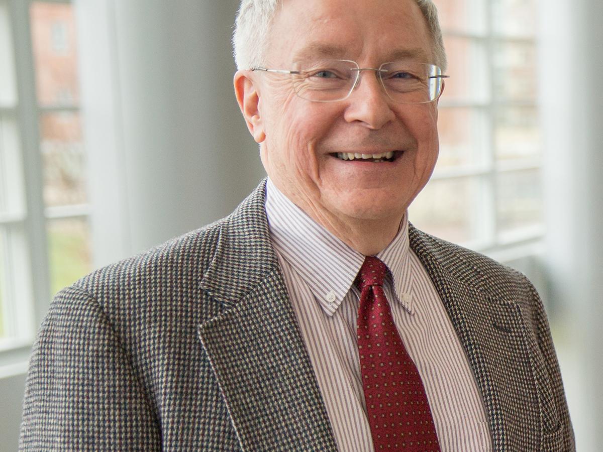 A headshot of Russell Barton