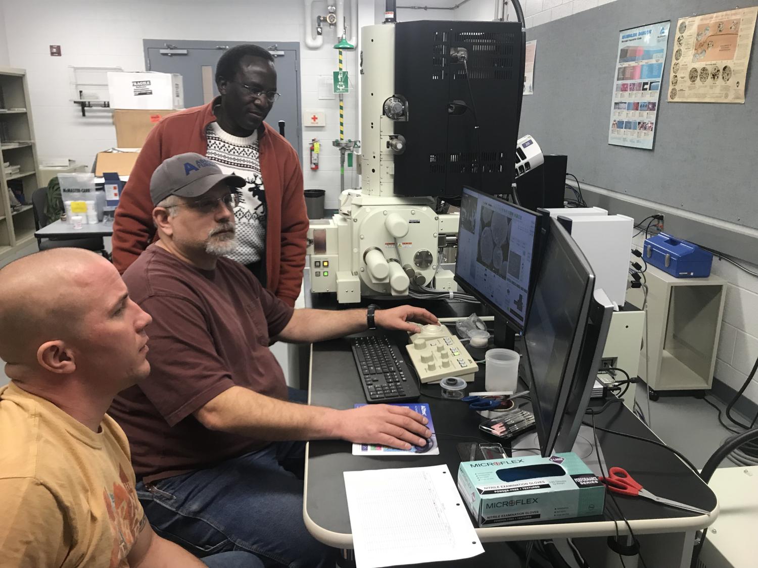 Examining the composition of powder metal samples under the new scanning electronic microscope. 