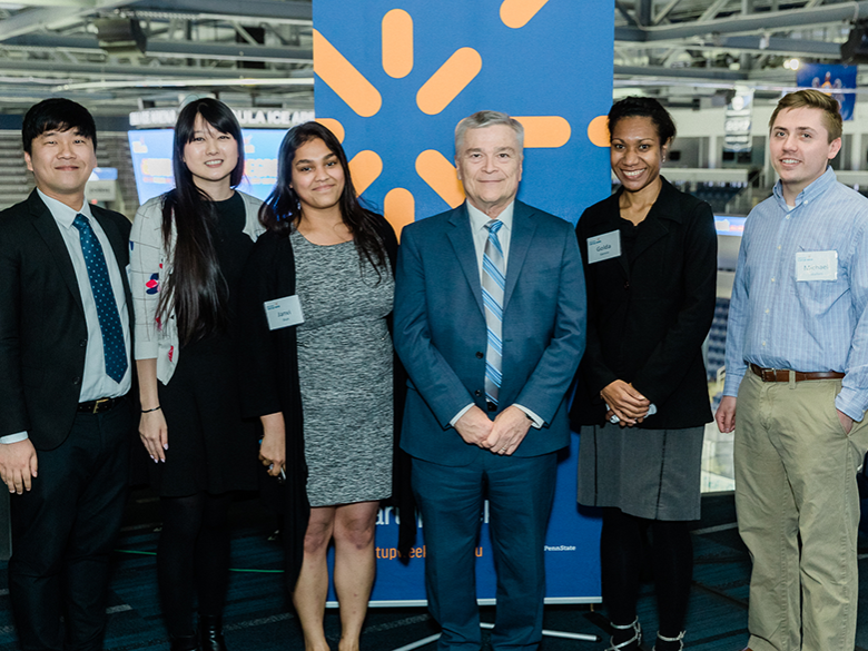The winning Global Legal Hackathon team, AuthenCheck, and President Barron at the Startup Week Pegula Celebration.