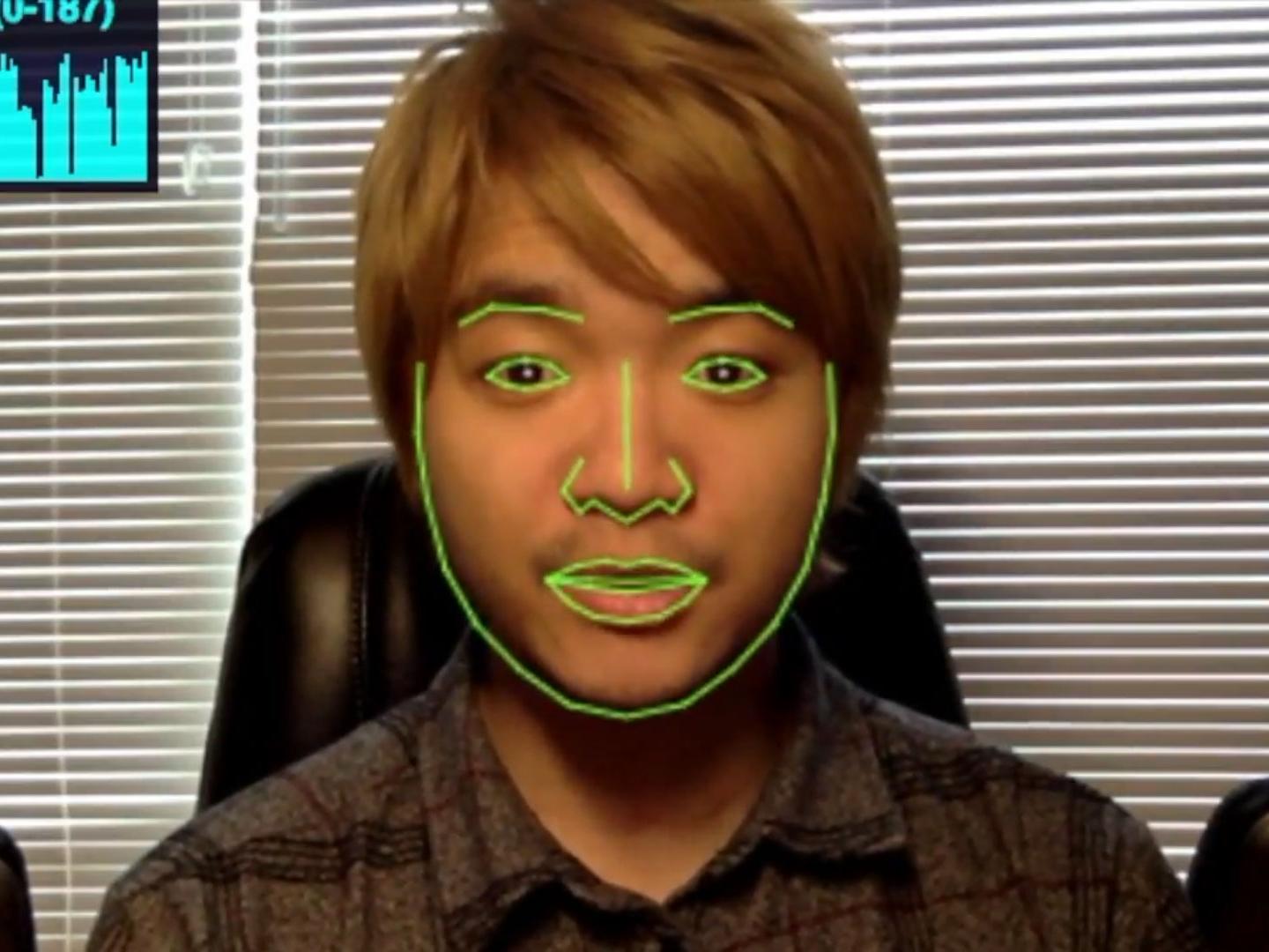 Yuya Ong demonstrating facial recognition technology