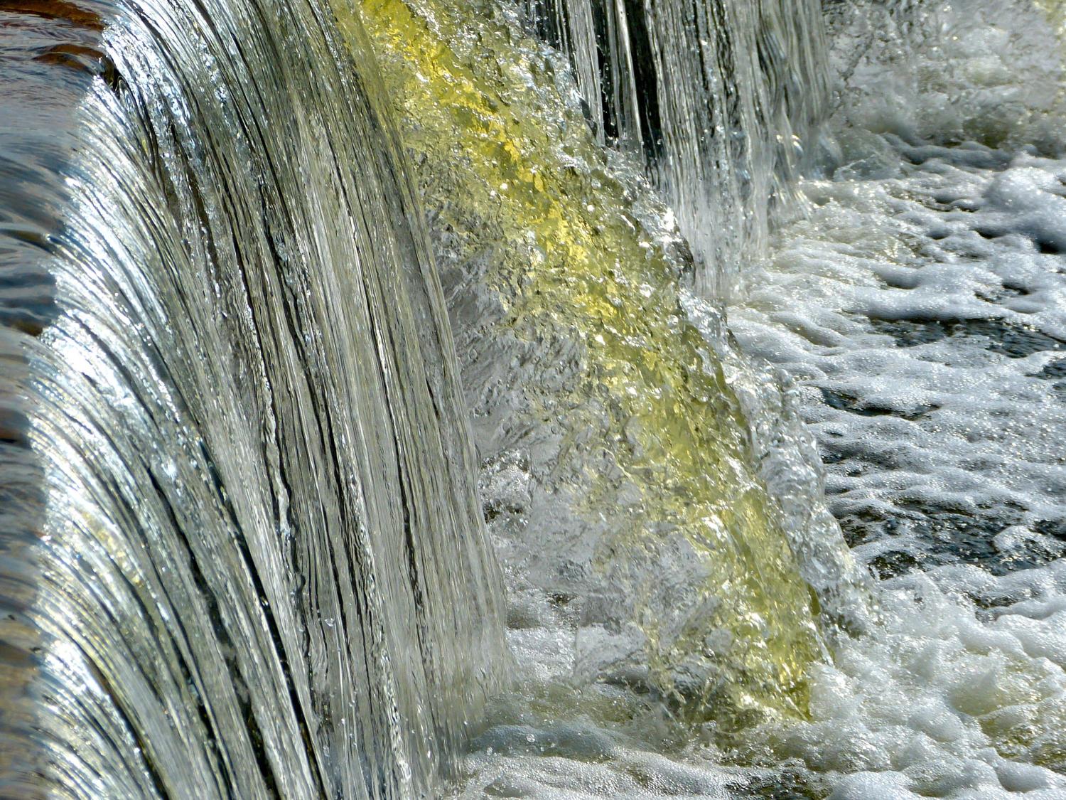 Water flowing over a ledge