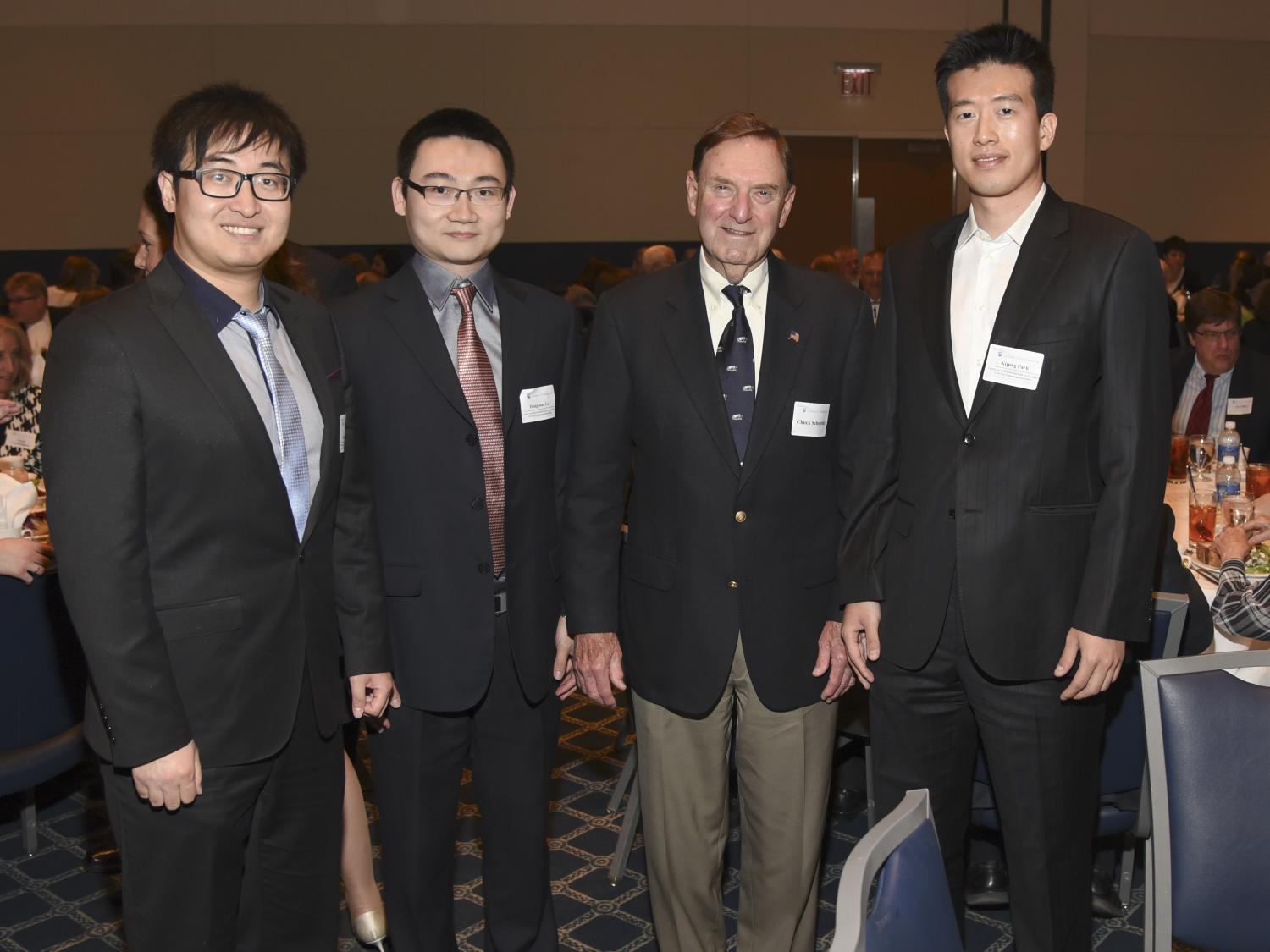 Charles Schneider with industrial engineering graduate students