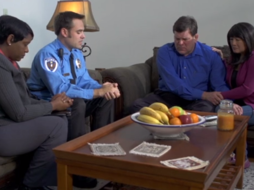 A screenshot from the We Regret to Inform You training video 