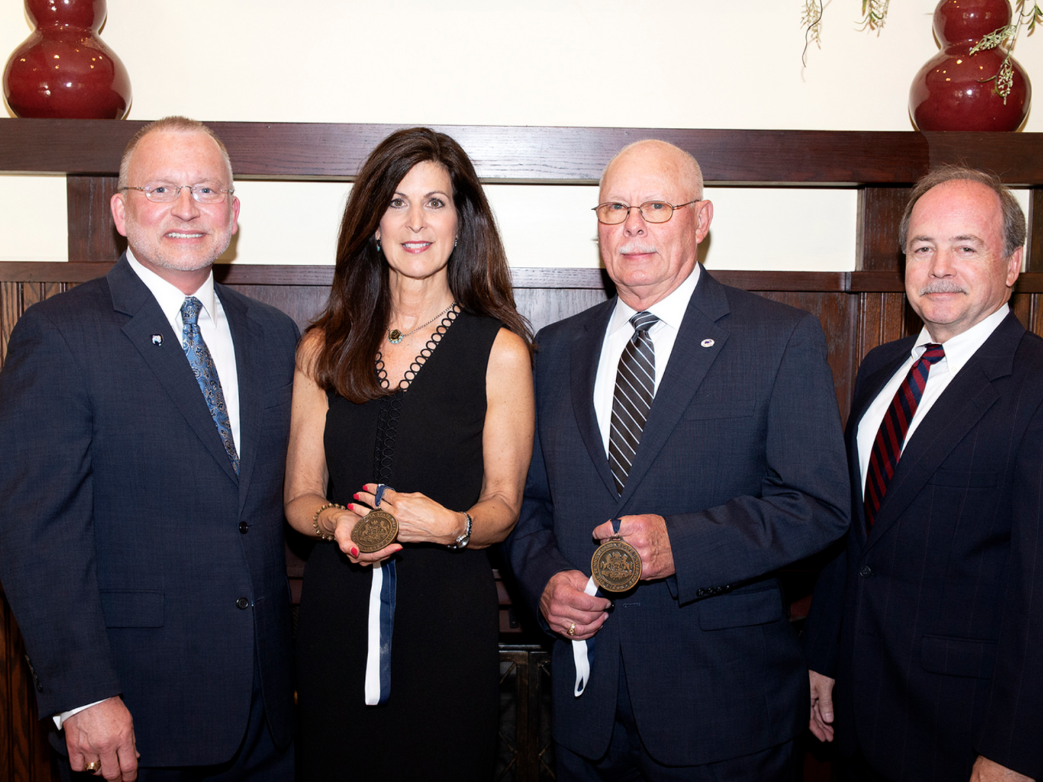 Dr. Charles Patrick, Chancellor/CAO; Paula R. Congelio, 2018 Outstanding Fellow; J. Blair McGill, 2018 Outstanding Alumnus; and Gary D. Monaghan, Chairman of the Advisory Board.
