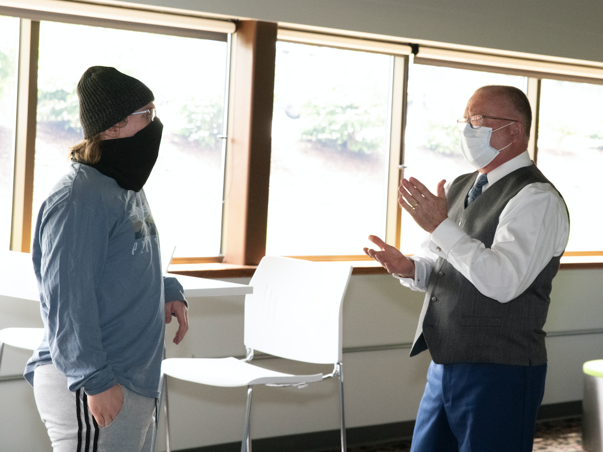 Erickson Discovery Grant Recipient Quentin Hales (left) with Chancellor Charles Patrick (right). 