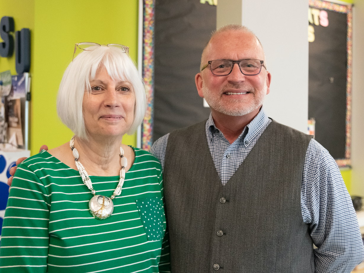 Cheryl Tkacs (left), instructional designer, celebrates her retirement from Penn State Fayette after fifteen years, with Charles Patrick (right), chancellor and chief academic officer.