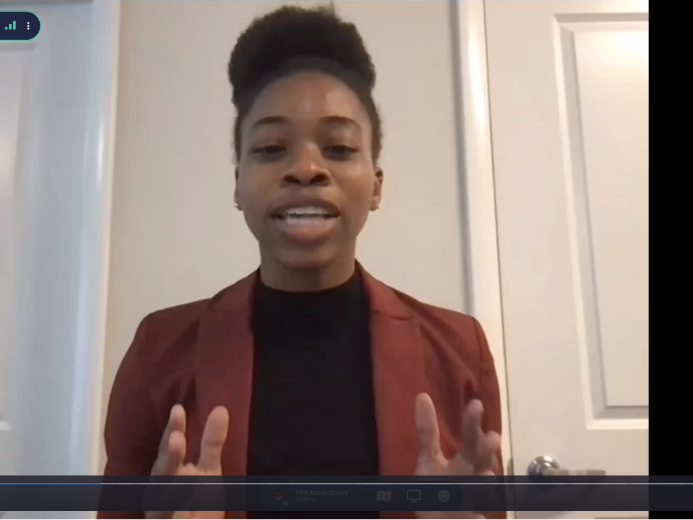 Young woman presenting and gesturing during a virtual presentation