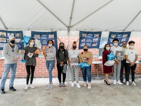 Student athletes pose for a picture