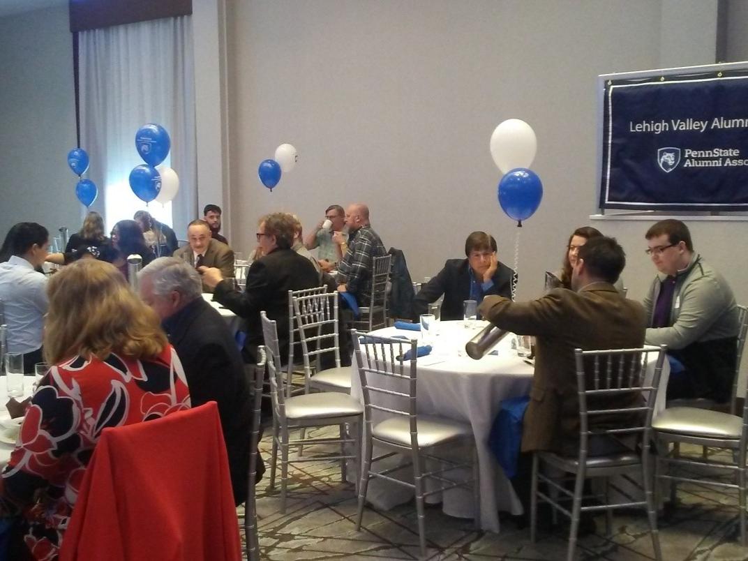 Groups of people sitting at tables
