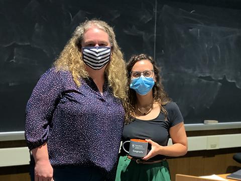 Louisa Holmes, left, assistant professor of geography, with Coffee Hour speaker Heather Randell, assistant professor of rural sociology and demography.