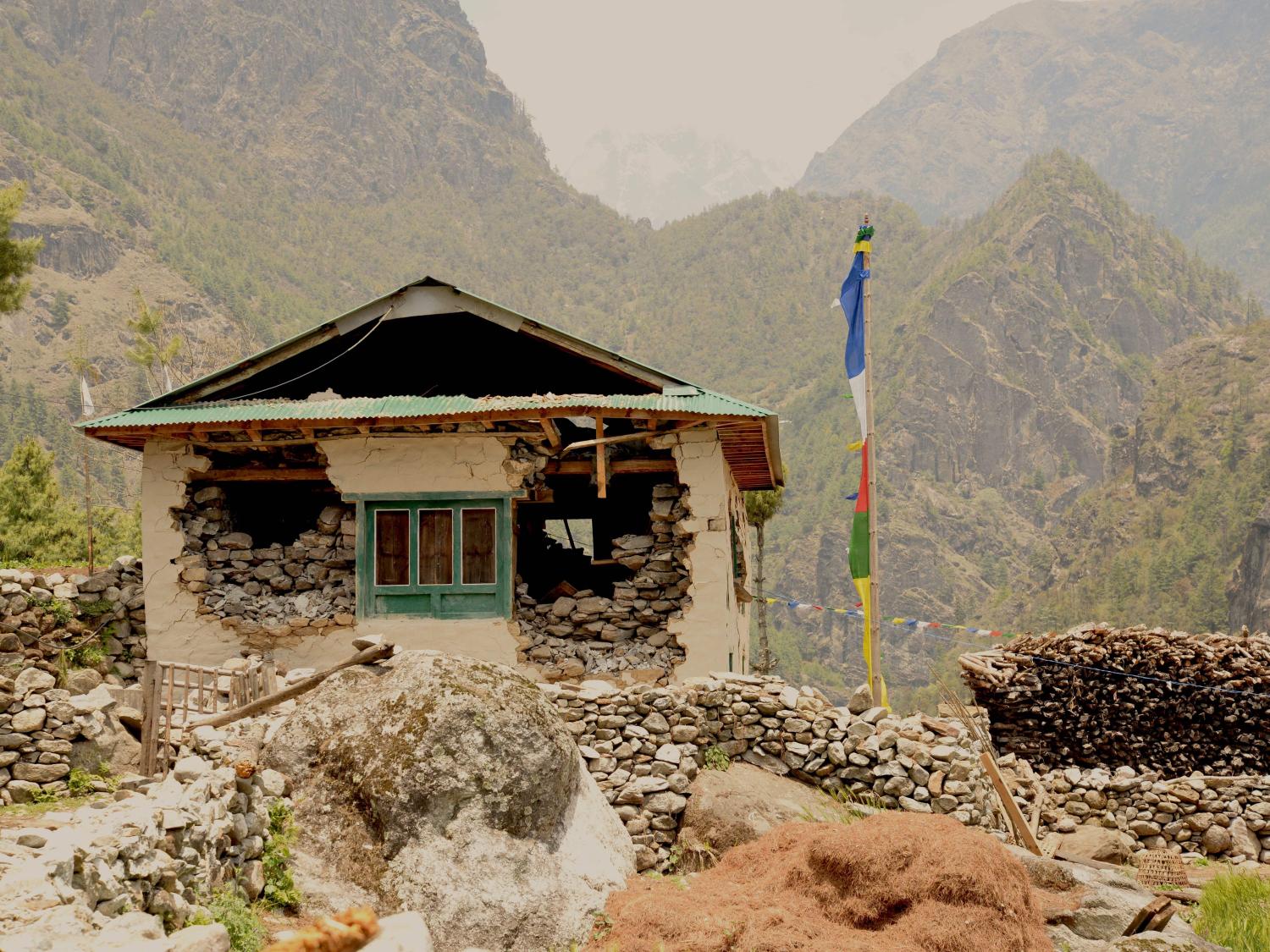 A house in Nepal is structurally damaged by the earthquake. 
