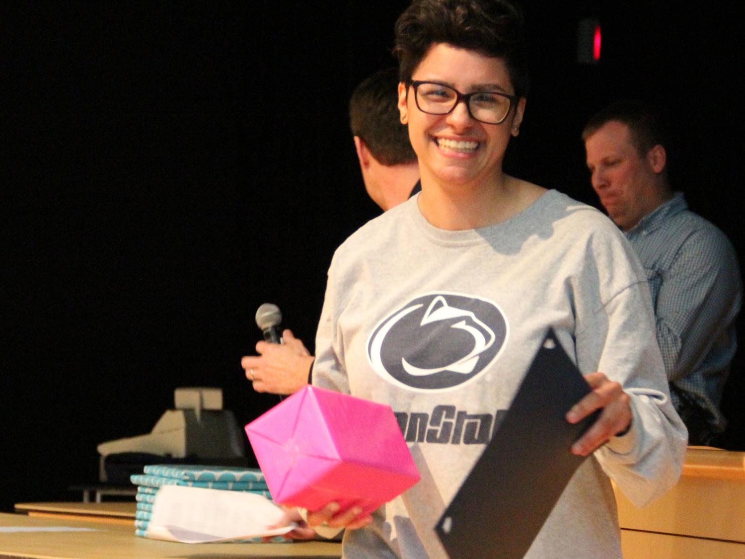 Samantha Donnelly receiving an award
