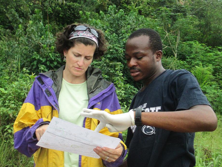 Erica Smithwick looking at map with collaborator
