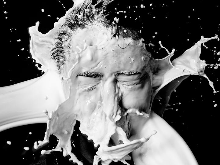 Splash of Milk Streams Impacting a Solid Surface