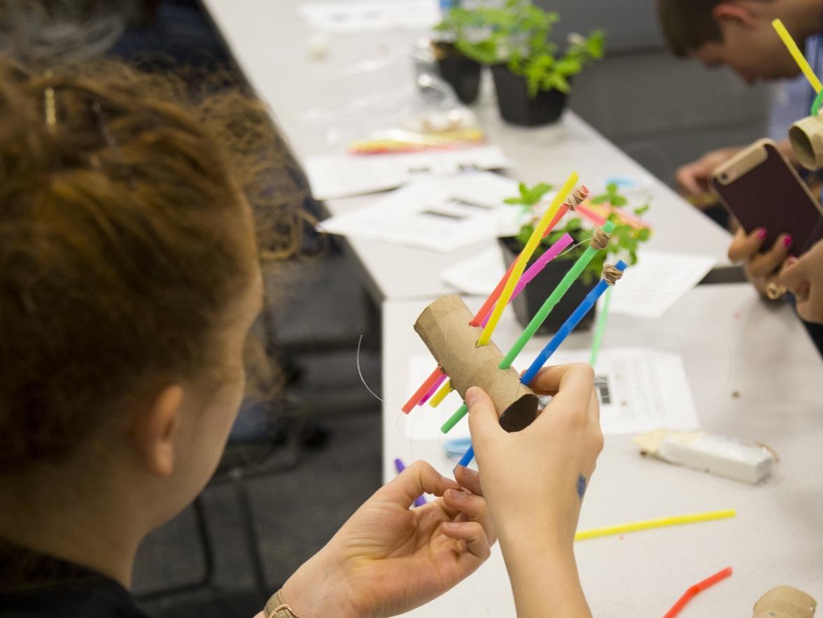 A student participating in a STEM exercise.