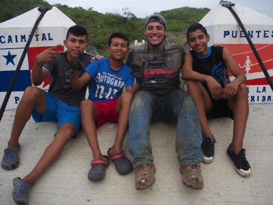 Photo of Mezzacappa with three Panamanian village children.