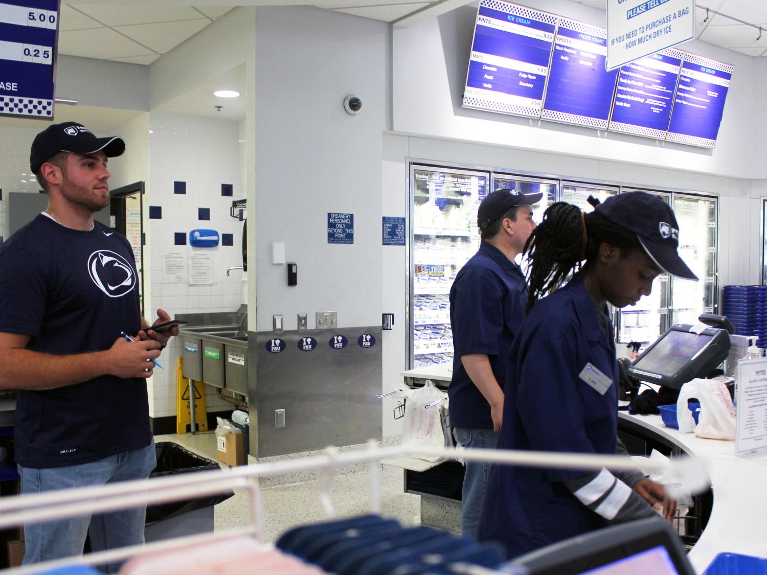 Stephen Richards recording data behind the Berkey Creamery counter