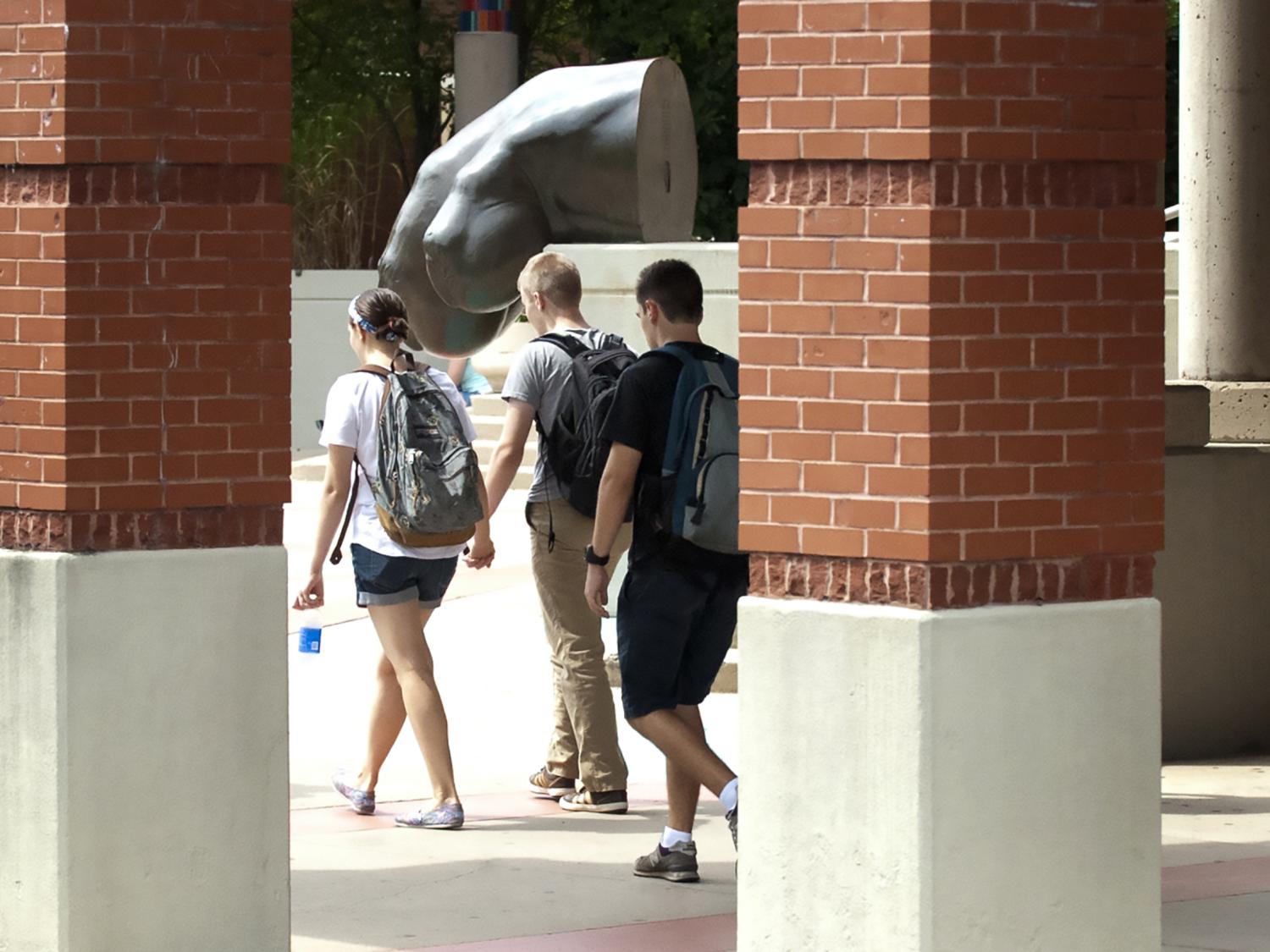 Penn State students walk past the Palmer Museum of Art on their way to class.