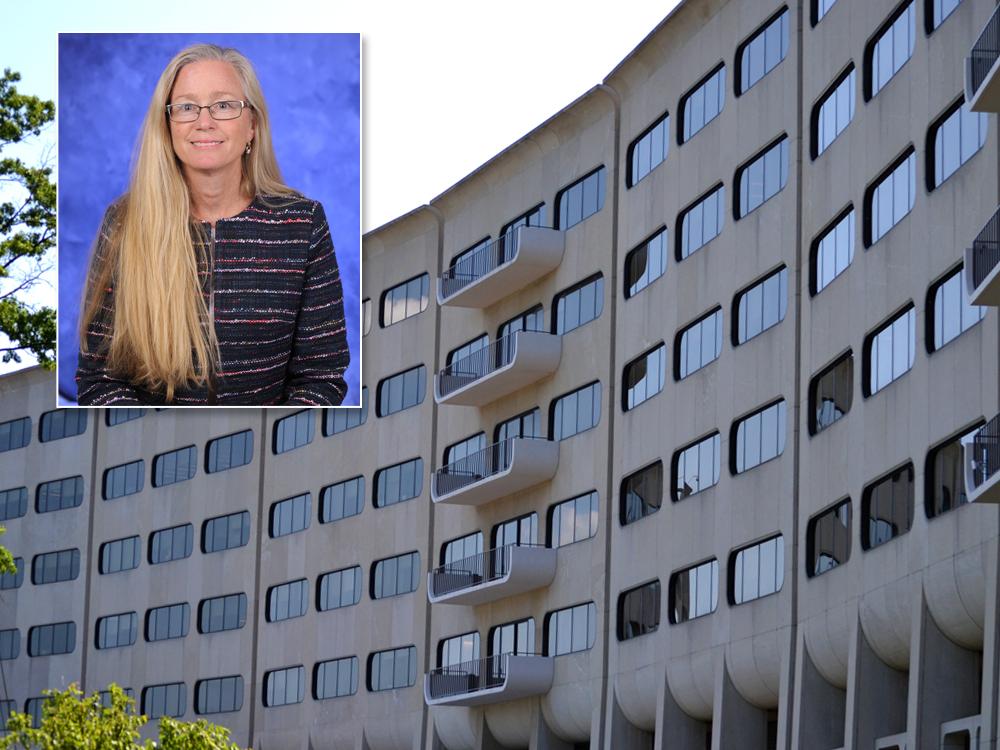 A photo of a woman smiling overlays a photo of a multi-story building with windows.
