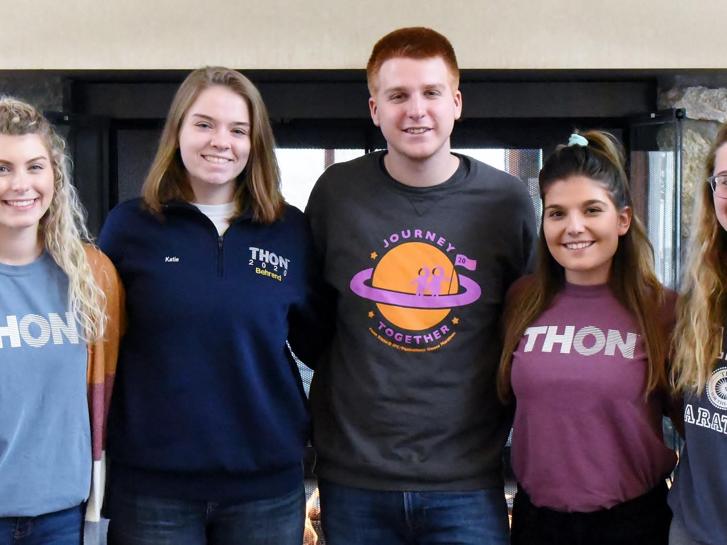 Five Penn State Behrend students pose for a group photo before THON.