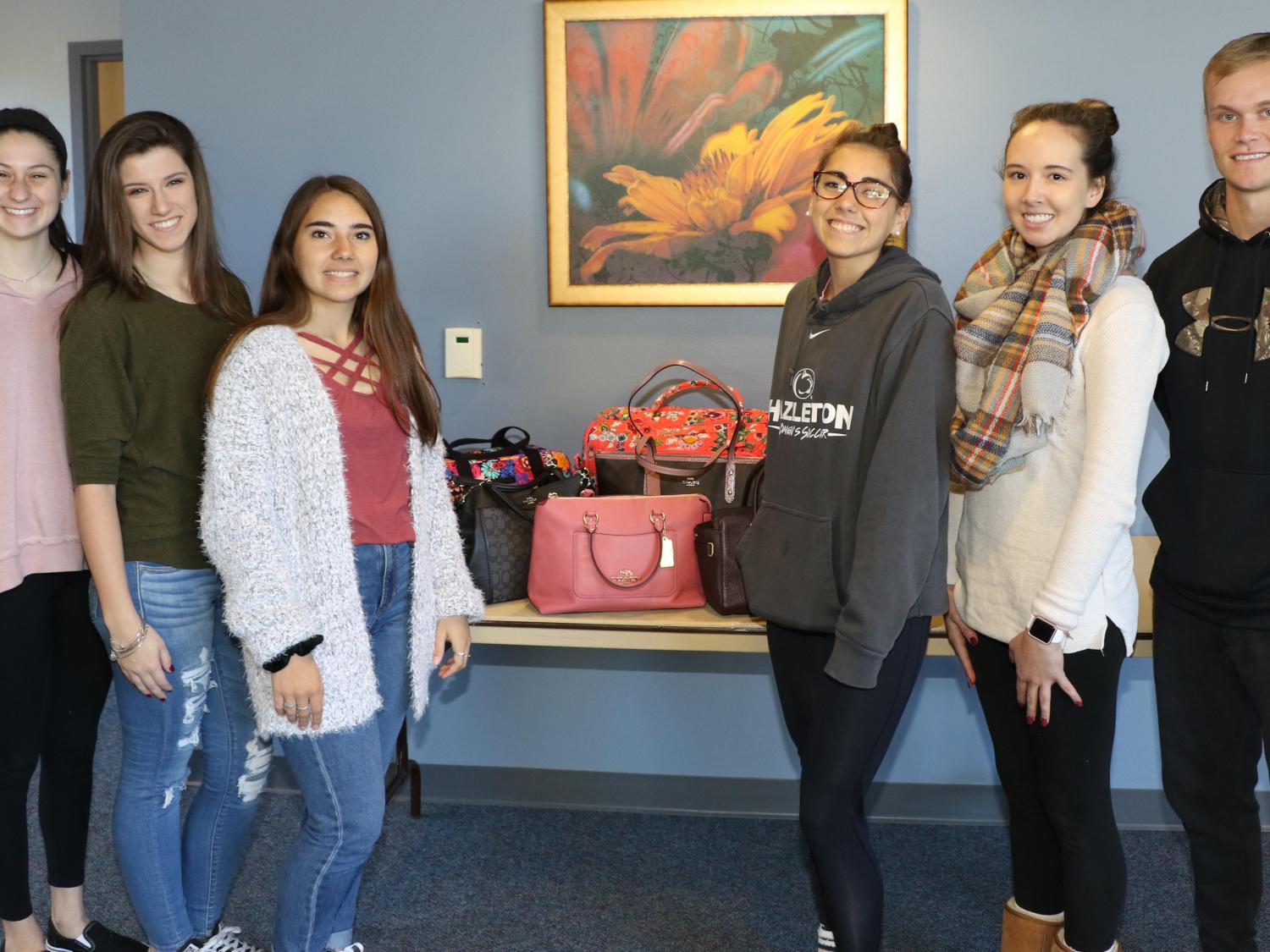 Penn State Hazleton’s THON chapter will host its annual designer purse bingo on Sunday, Nov. 11. Members of THON at Penn State Hazleton are, from left: Christine Turse, chair; Eden Triano, assistant chair; Camille Principe, member morale captain; Meghann Principe, member morale captain; Dana Greenall, special events captain; and Charlie Karchner, family relations chair.