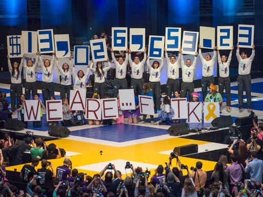 Students reveal the total amount of money raised for THON 2015.