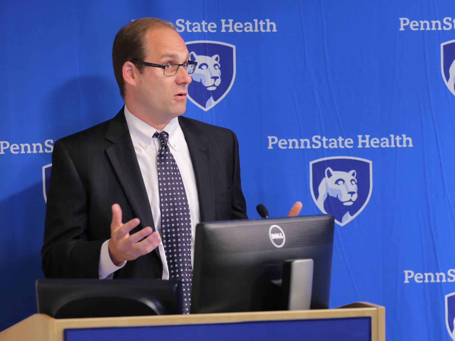 Dr. James Waxmonsky speaks at a news conference.