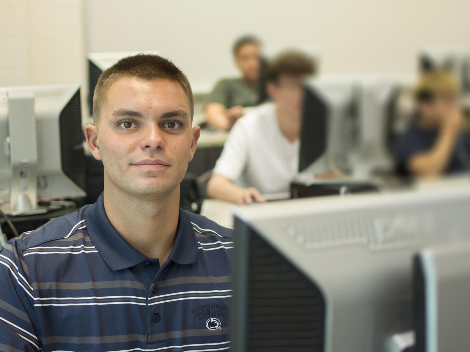 Evan Talbert sitting at computer