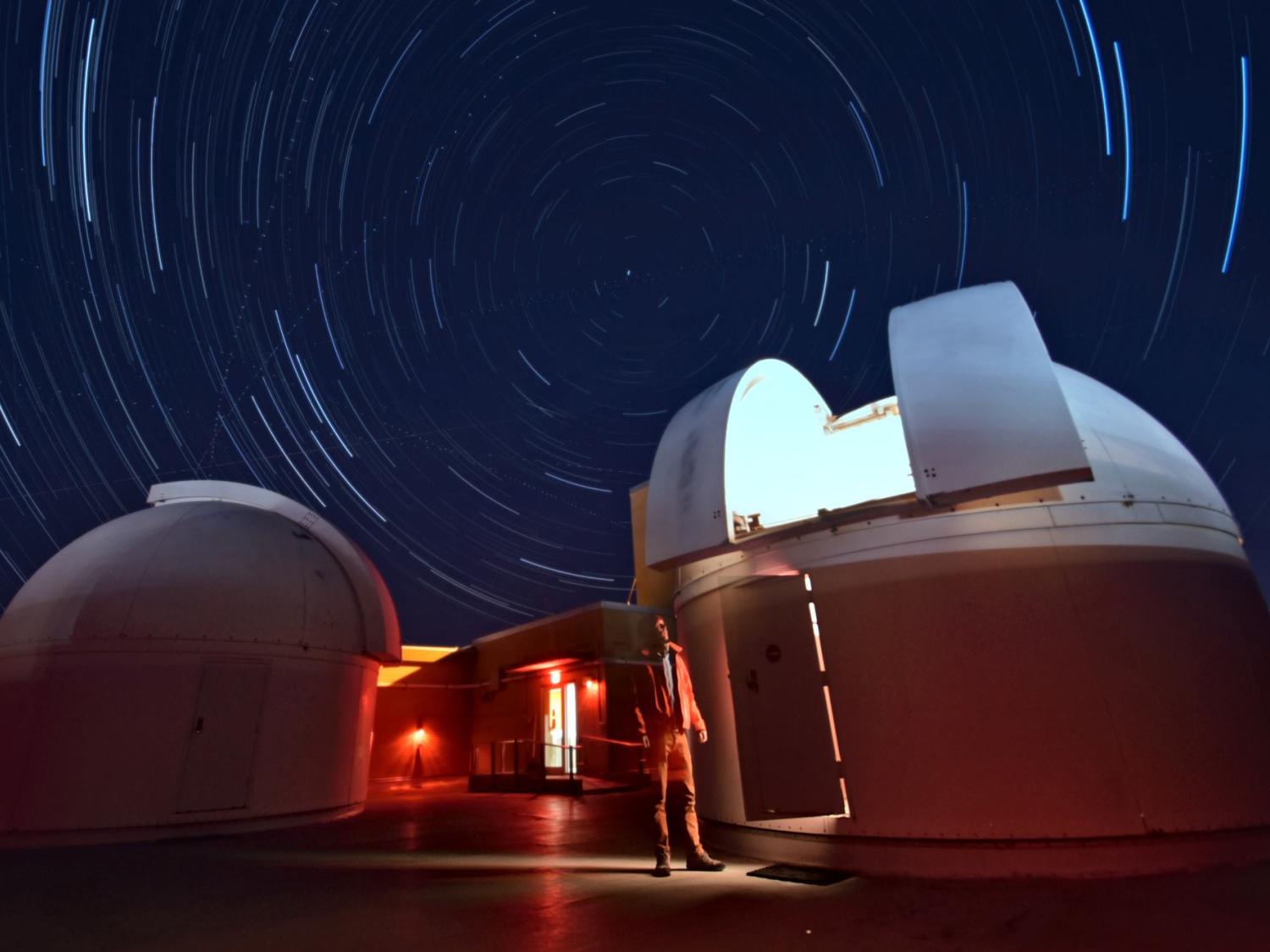 Nighttime view of telescopes on the roof of Davey Lab at Penn State's University Park campus