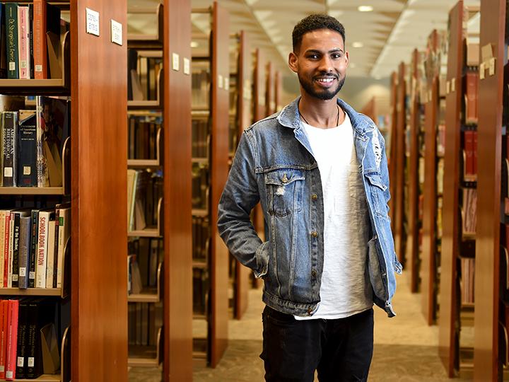 Rezene travels across the world to earn degree