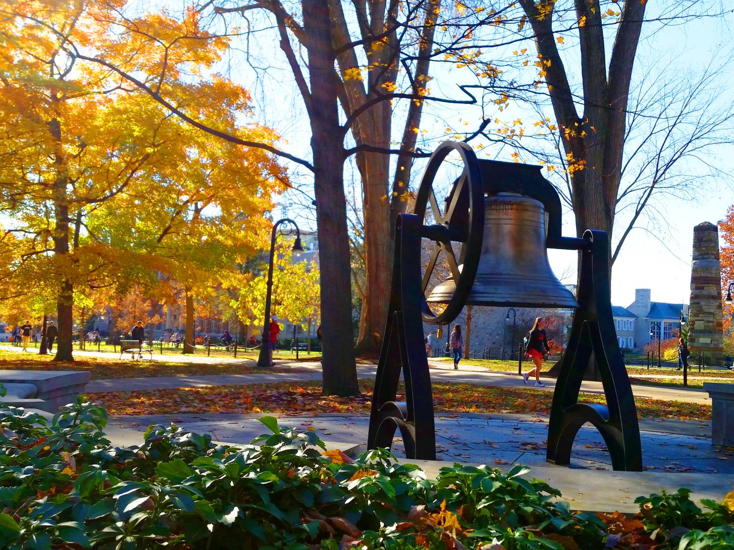 A photo of the Old Main Bell in fall.