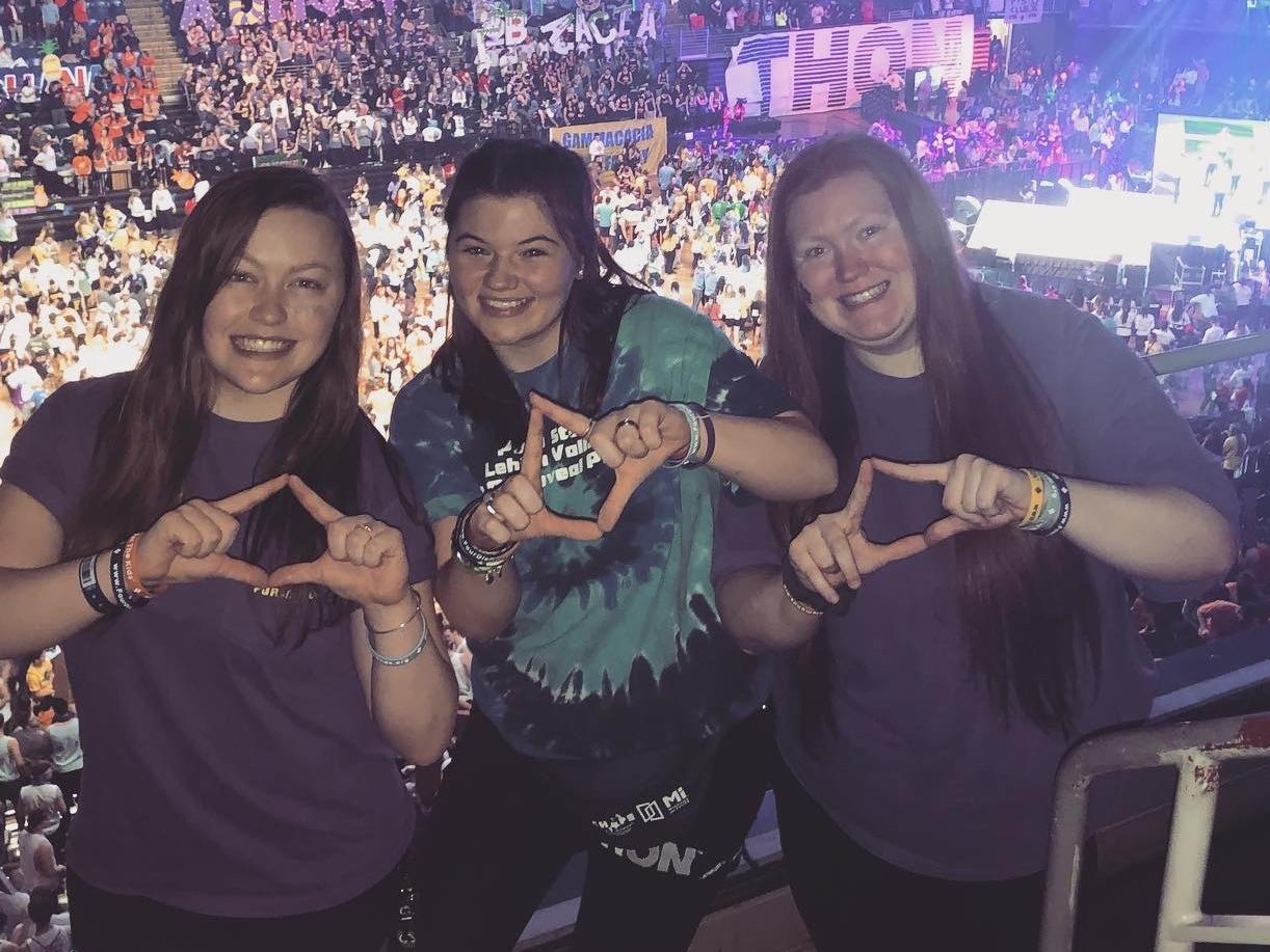 Three students at dance marathon