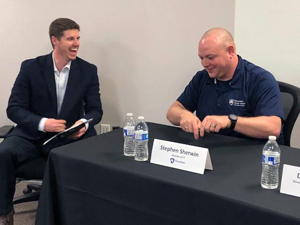 Stephen Sherwin (Right) answering a question asked by Cliff Miller (Left)