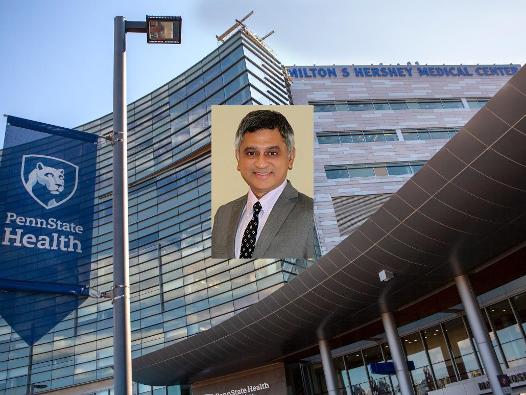 A headshot of Dr. Yatin Vyas superimposed over a photo of Hershey Medical Center.