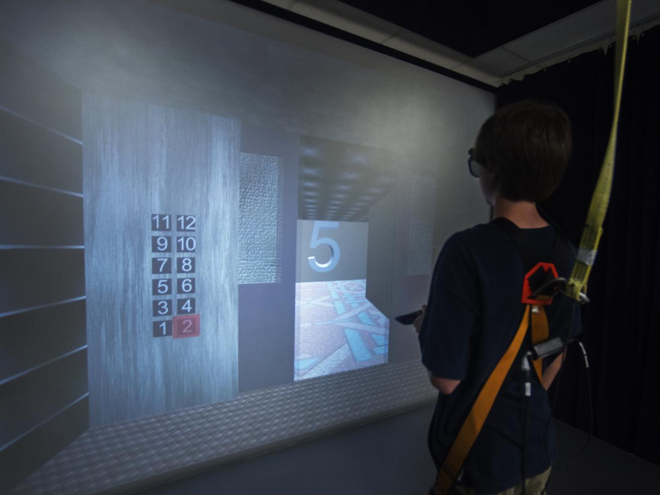Young athlete navigates through virtual room in concussion test