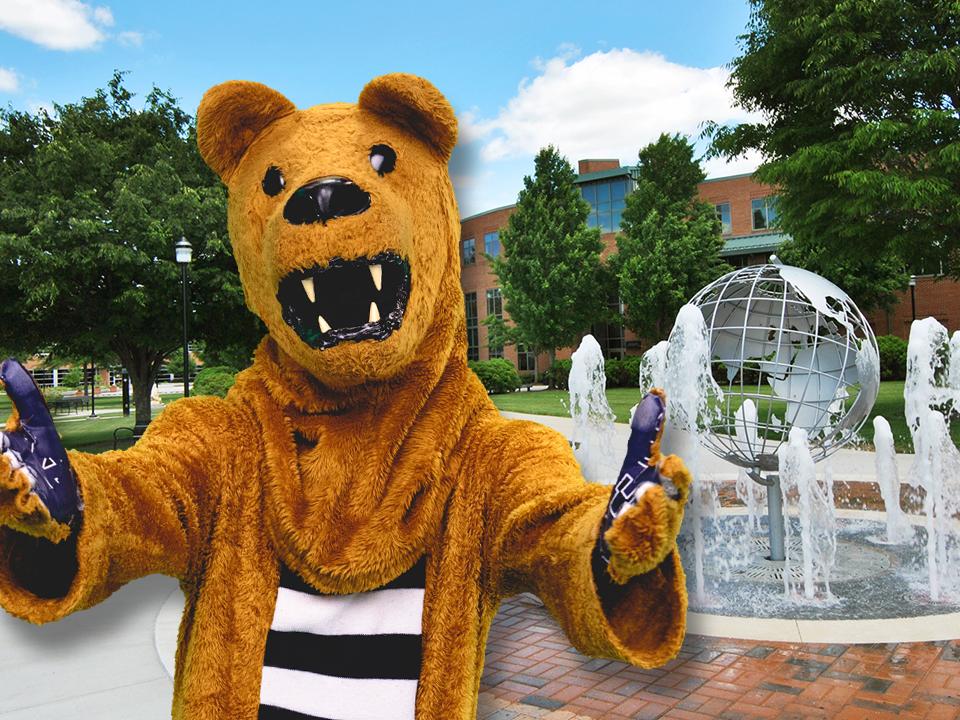 Nittany Lion in front of Globe Fountain on campus