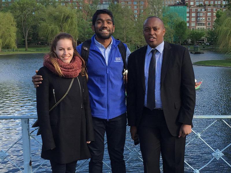 Vivek Thomas stands with other professionals in the energy industry