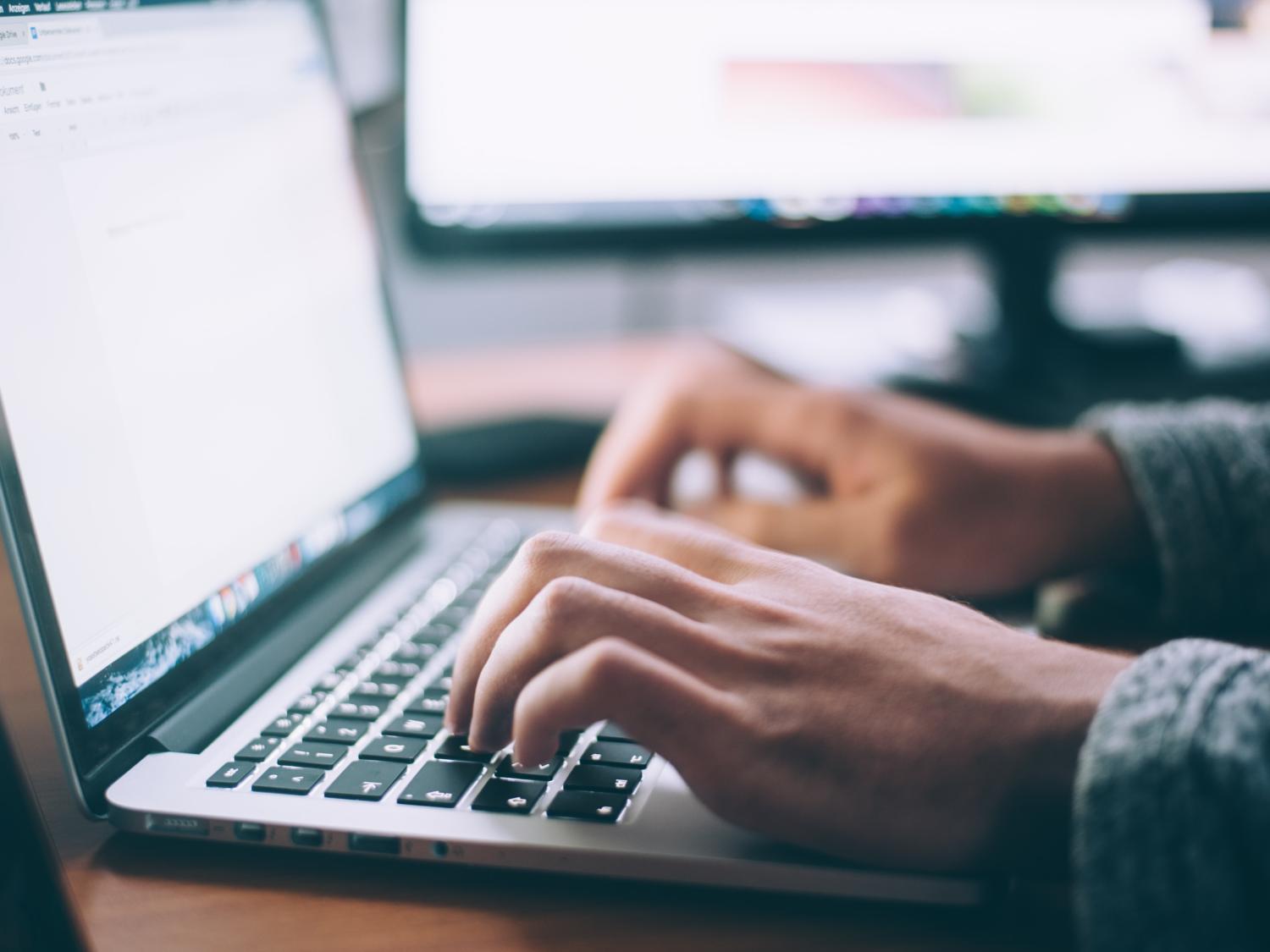 laptop and hands