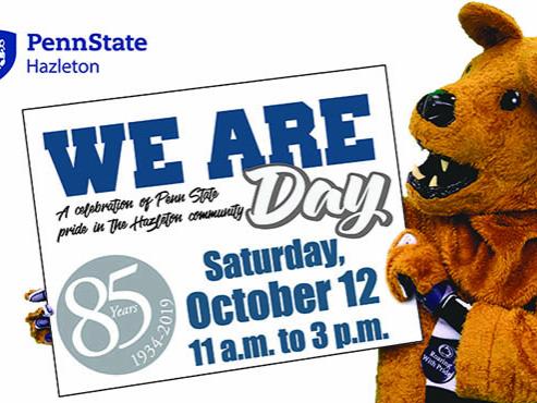 Costumed Nittany Lion holding a sign with We Are Day, Saturday, October 12 from 11 a.m. to 3 p.m.