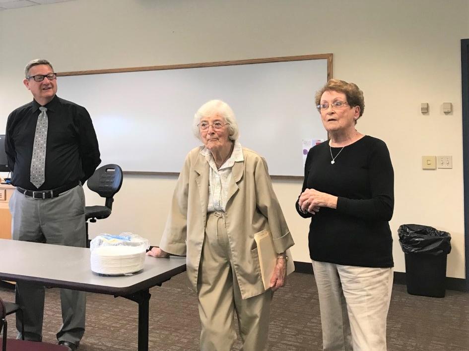 Dr. Todd Adams introduces WWII speakers to the class