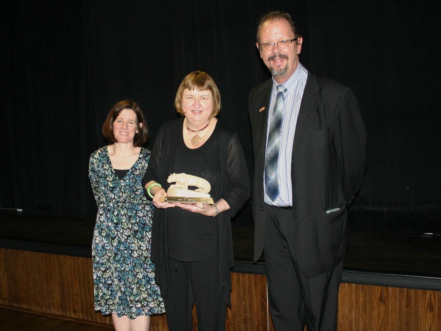 Senior instructor in English Jane Waitkus, center, recently retired from Penn State Hazleton. At left is Director of Academic Affairs Elizabeth Wright and at right is Chancellor Gary Lawler.