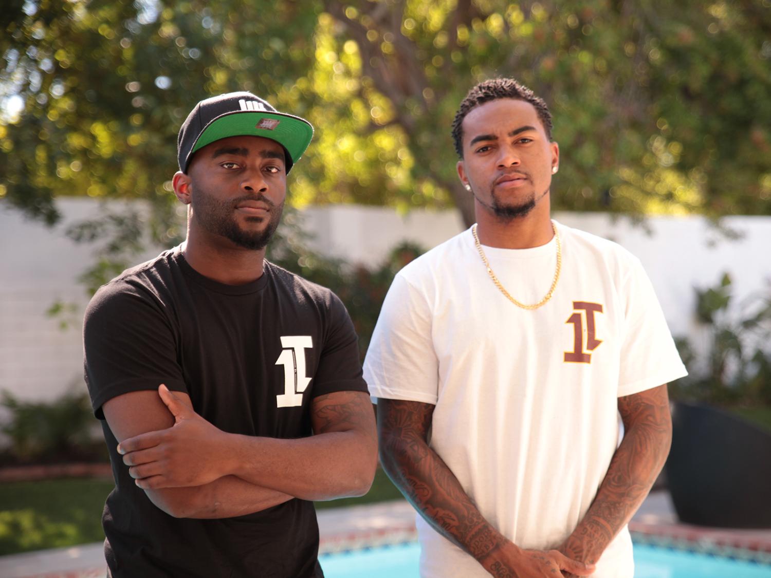 Alum Mike Wallace (left) with DeSean Jackson