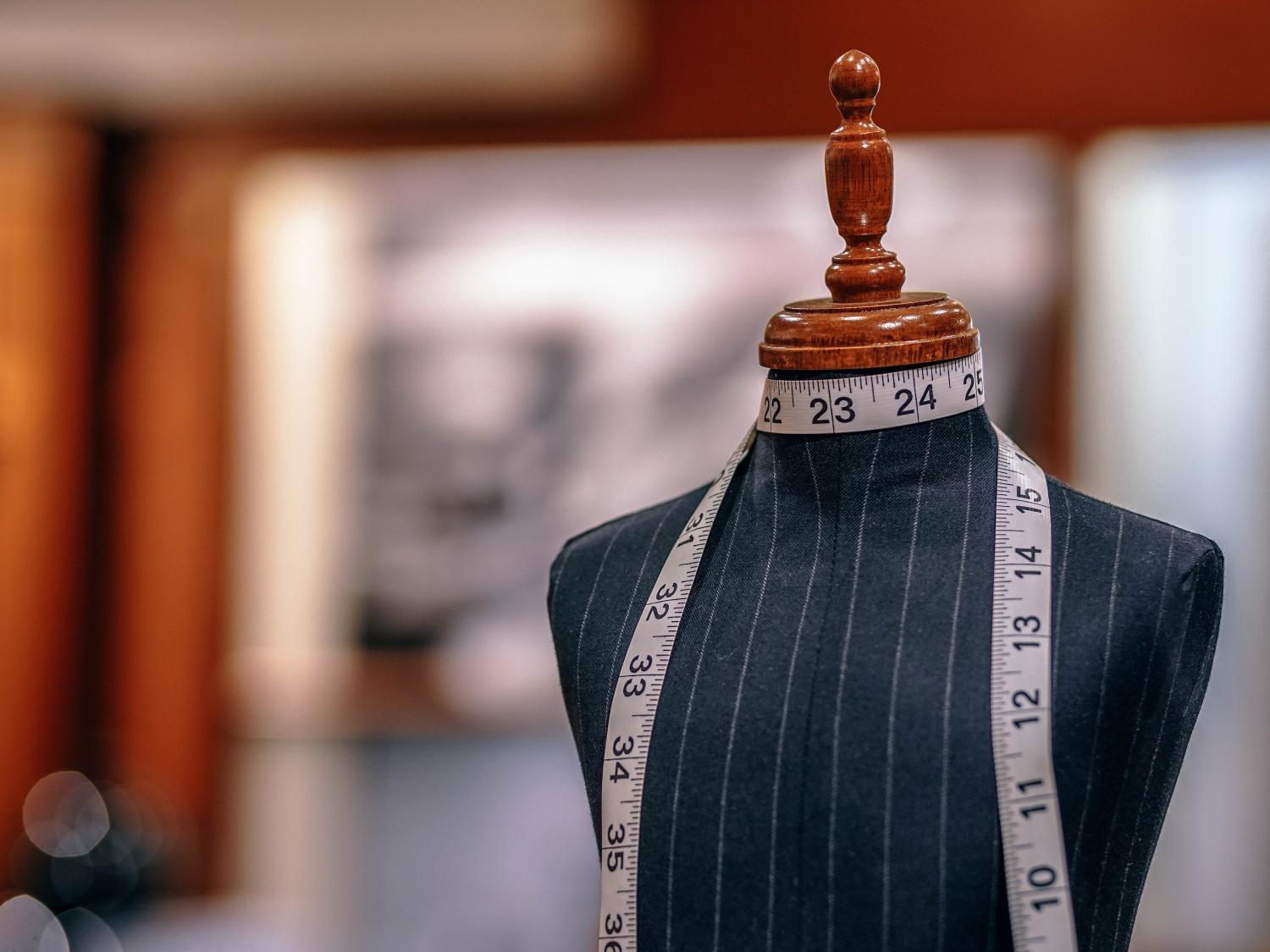 Stock photograph of a dress form mannequin in a sales room