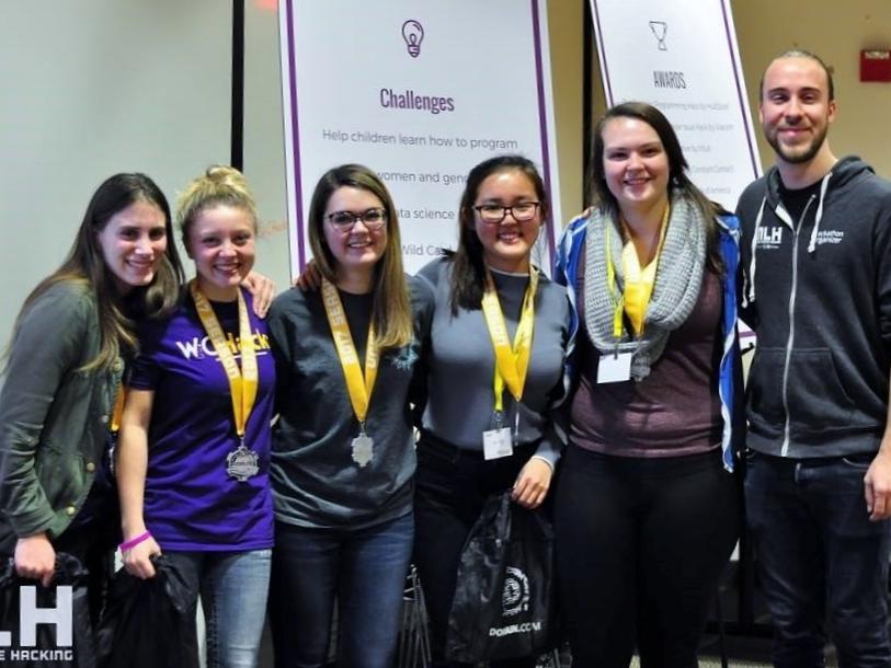 A group photo of student hackers at the WiCHack event at RIT.