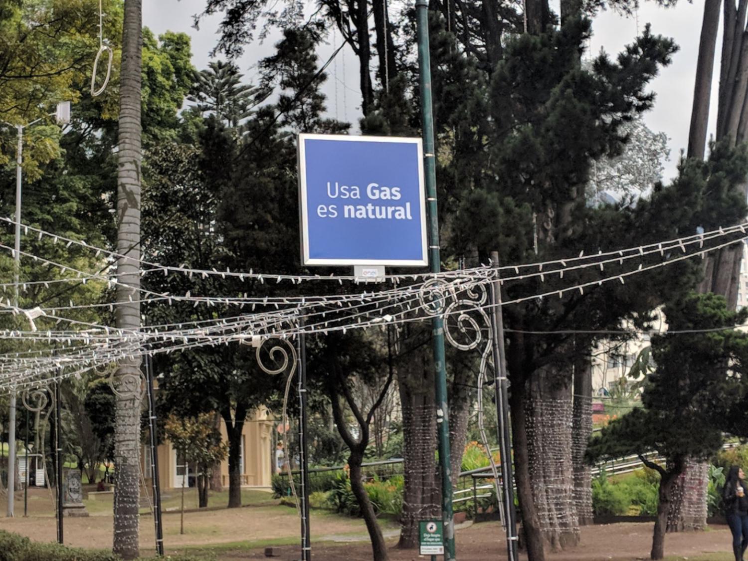 A sign promoting natural gas in Enrique Olaya Herrera National Park, Bogota, Colombia